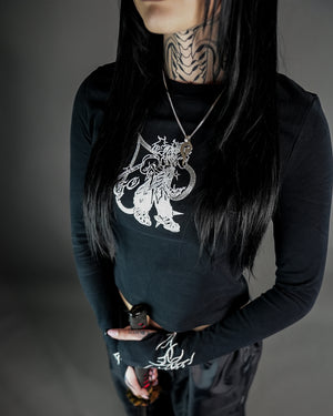 Chaos Longsleeve Tee - Thumb Holes & Silver Embroidery featuring cropped fit and bold silver graphic on chest, styled for edgy wear.
